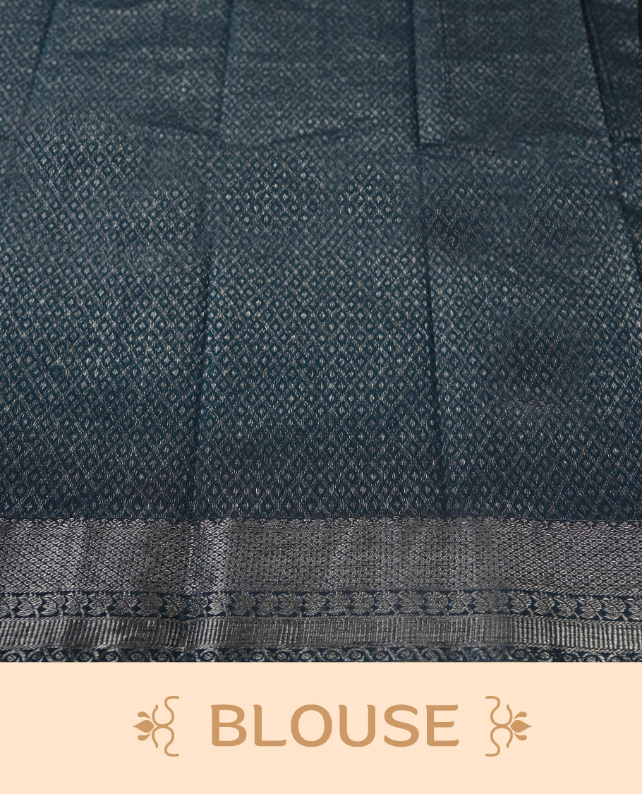 Cobalt blue colour silk cotton saree adorned with a shimmering silver zari border and intricate woven designs, blending elegance with tradition, Paired with a matching blouse, its perfect for festive and special occasions.