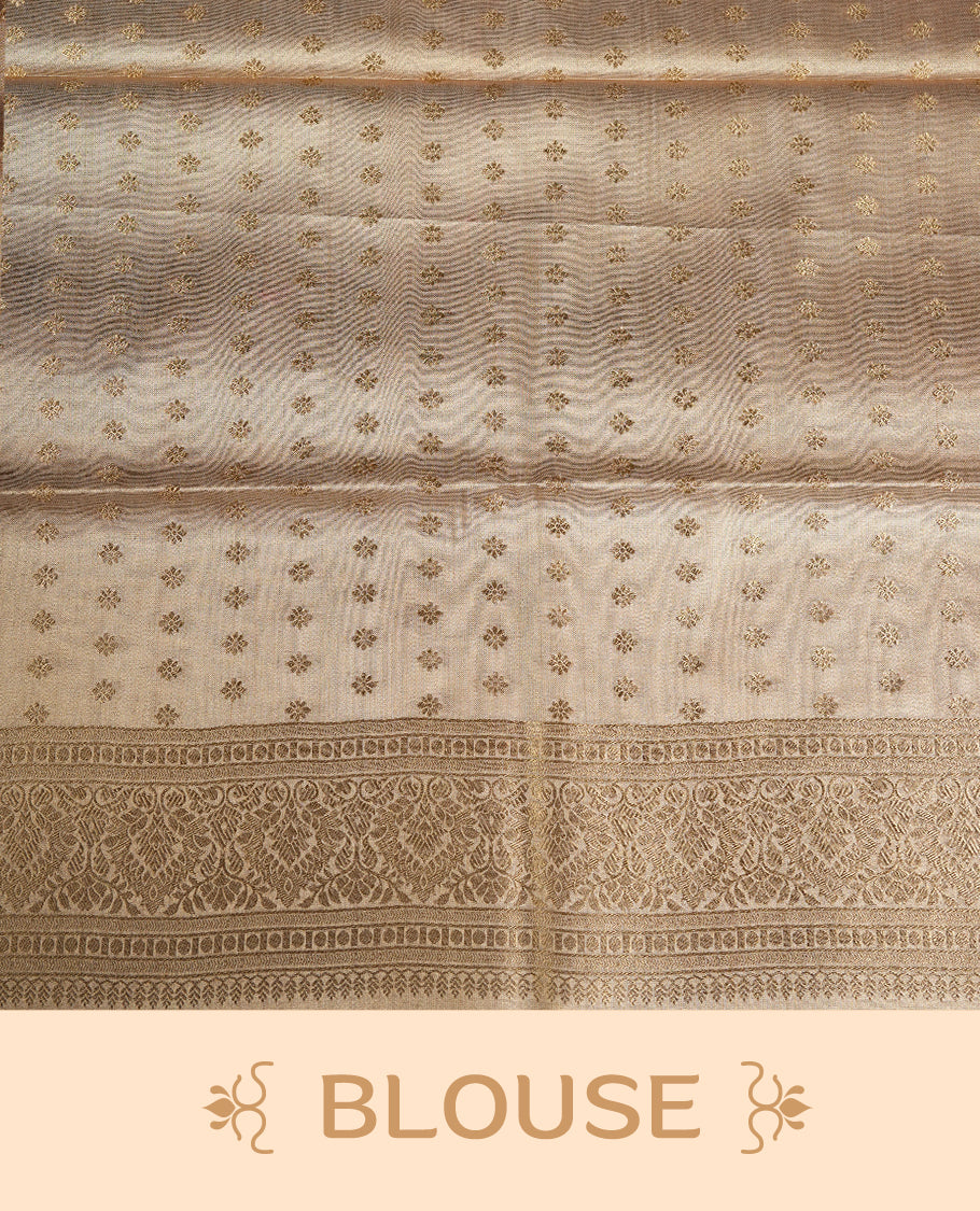 Light Gold colour tissue banaras silk saree featuring antique gold peacock zari motifs on the body with rich traditional zari border and pallu, paired with a matching blouse piece.