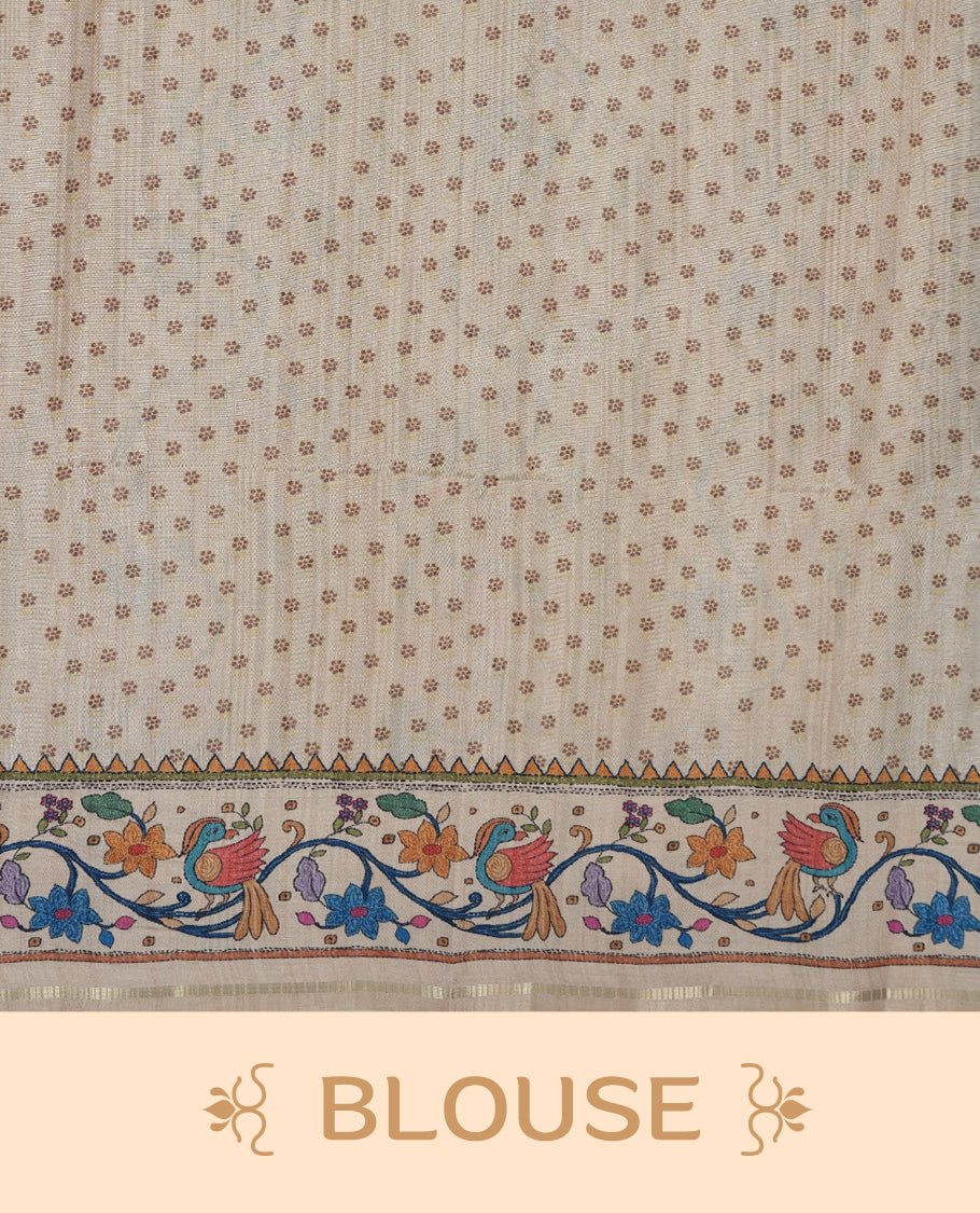 Dark green colour semi tusser silk saree featuring gold zari check pattern with floral butti motifs, with contrast floral kodi & bird pattern and paired with matching blouse.