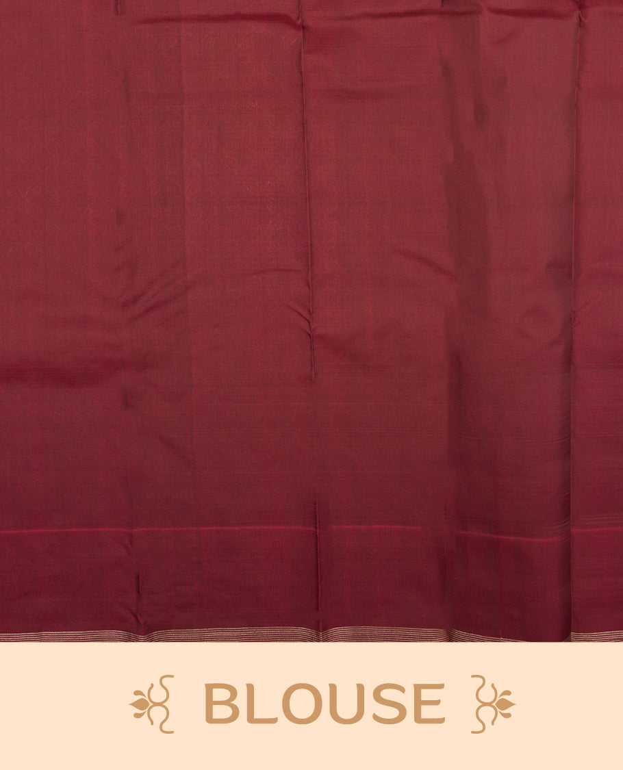 Dark maroon colour semi soft silk saree featuring a self coloured golden textured patterned body, complemented by self coloured pallu & golden border and a matching blouse piece.