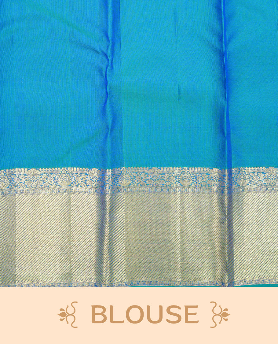 Peacock colour pure wedding silk saree featuring gold zari designed strips pattern on body, complemented by self colour with traditional border, comes with matching blouse piece.