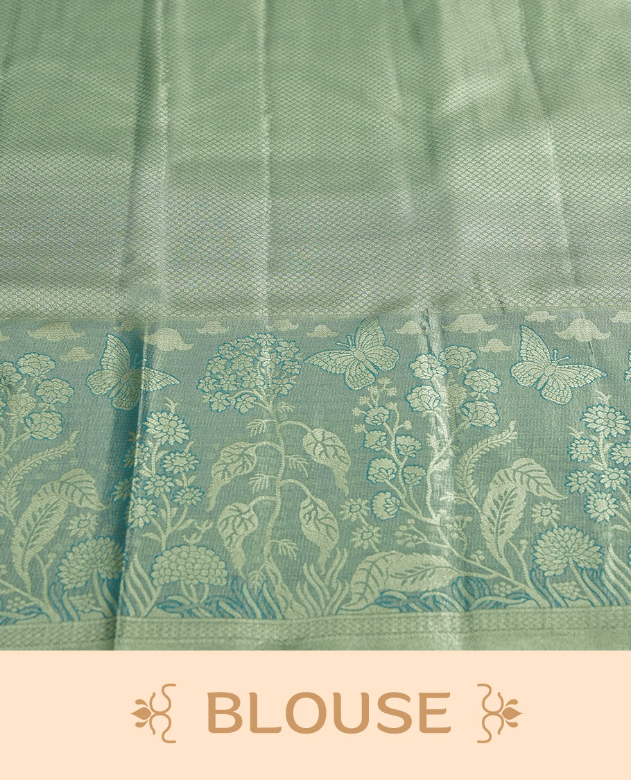 Saffron colour and Antique gold Zari Tissue Brocade Saree features intricate floral Motifs on body and fancy border & pallu with floral patterns, paired with matching blouse