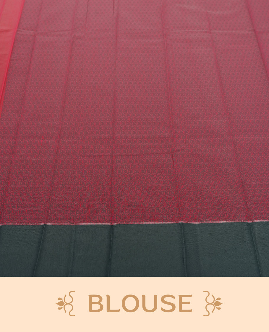 Crimson pink colour silk cotton saree featuring elegant floral zari motifs on the body, complemented by a rich contrast dark plain grey border and pallu with traditional woven detailing & Comes with a matching blouse piece.