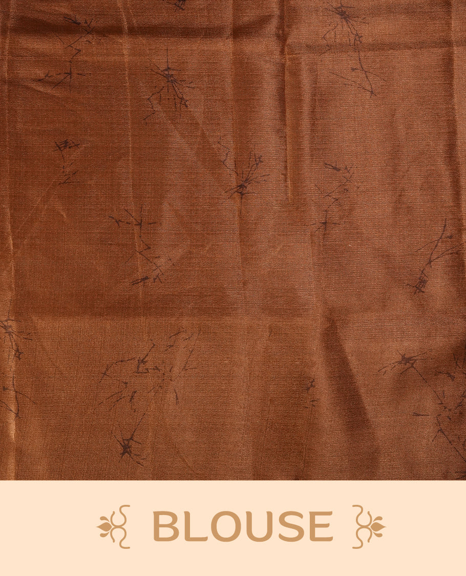 Dusty mustard colour saree adorned with bold off white floral prints, blending tradition with a modern twist & paired with a matching blouse.