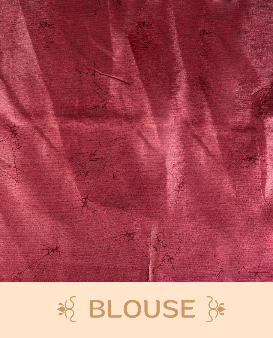 Vivid maroon colour saree adorned with bold off white floral prints, blending tradition with a modern twist & paired with a matching blouse.