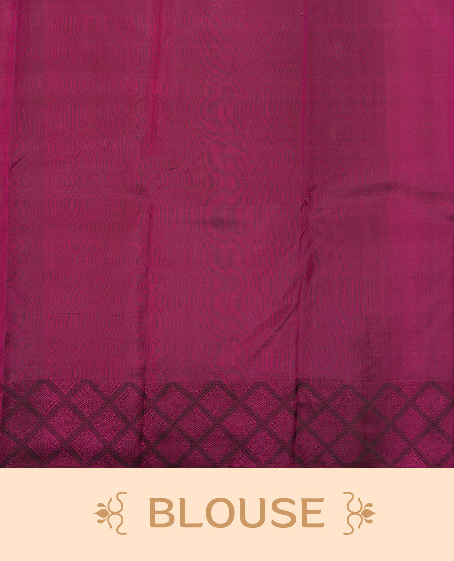 Deep violet colour Vasundhara silk saree adorned with all-over gold square motifs on the body, complemented by a Black & pink colour zigzag border and paired with a matching blouse piece.