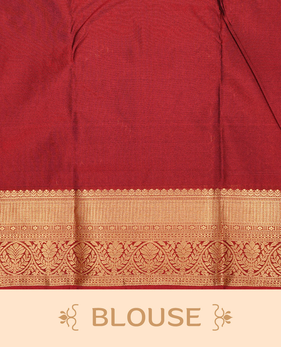 Black colour semi Wedding silk saree featuring Gold zari motifs on body, enhanced with Contrast red colour with traditional border, paired with matching blouse piece.