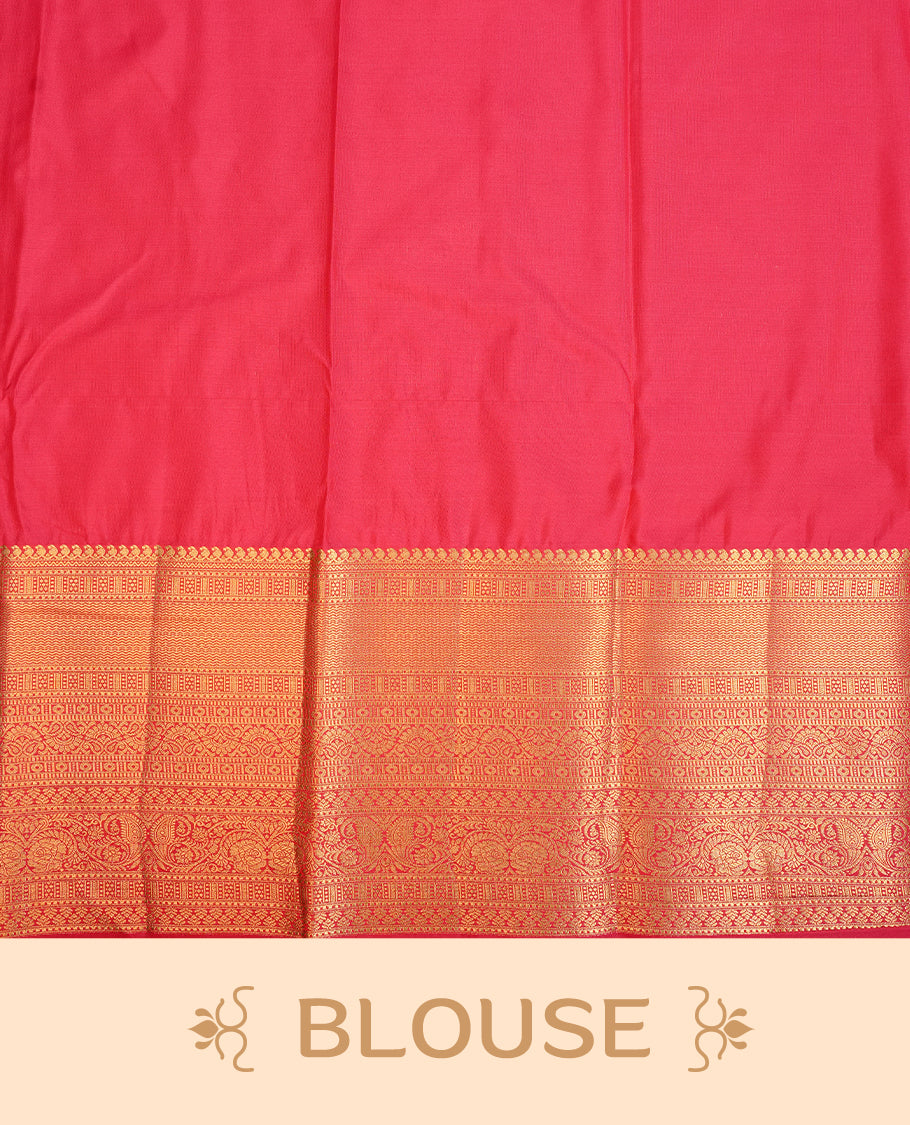 Green colour semi wedding saree featuring Gold zati floral kodi pattern on body, complemented by contrast magenta with traditional border, paired with matching blouse piece.