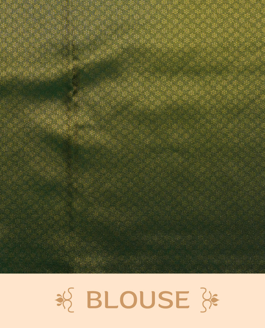 Green colour Mulberry silk saree featuring Gold zari buttas on body, complmented by self colour with Gold zari dual peacock in Temple design border, comes with matching blouse piece.