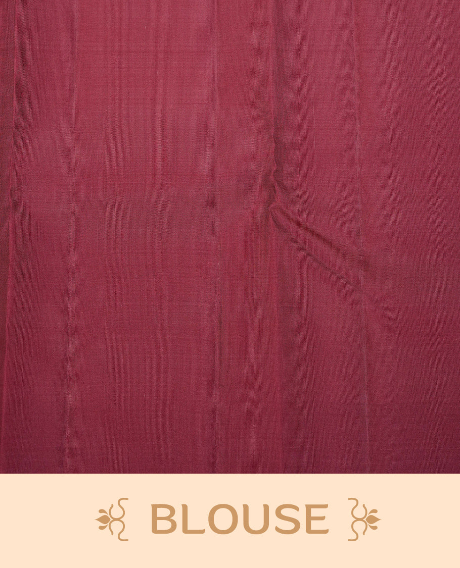 Rust Orange Colour Traditional Kancheepuram Silk Saree Featuring Copper Zari Floral Motifs on the Body, Designed With a Copper Zari Maroon Border and with a Grand Maroon Pallu, Paired with a Matching Blouse.