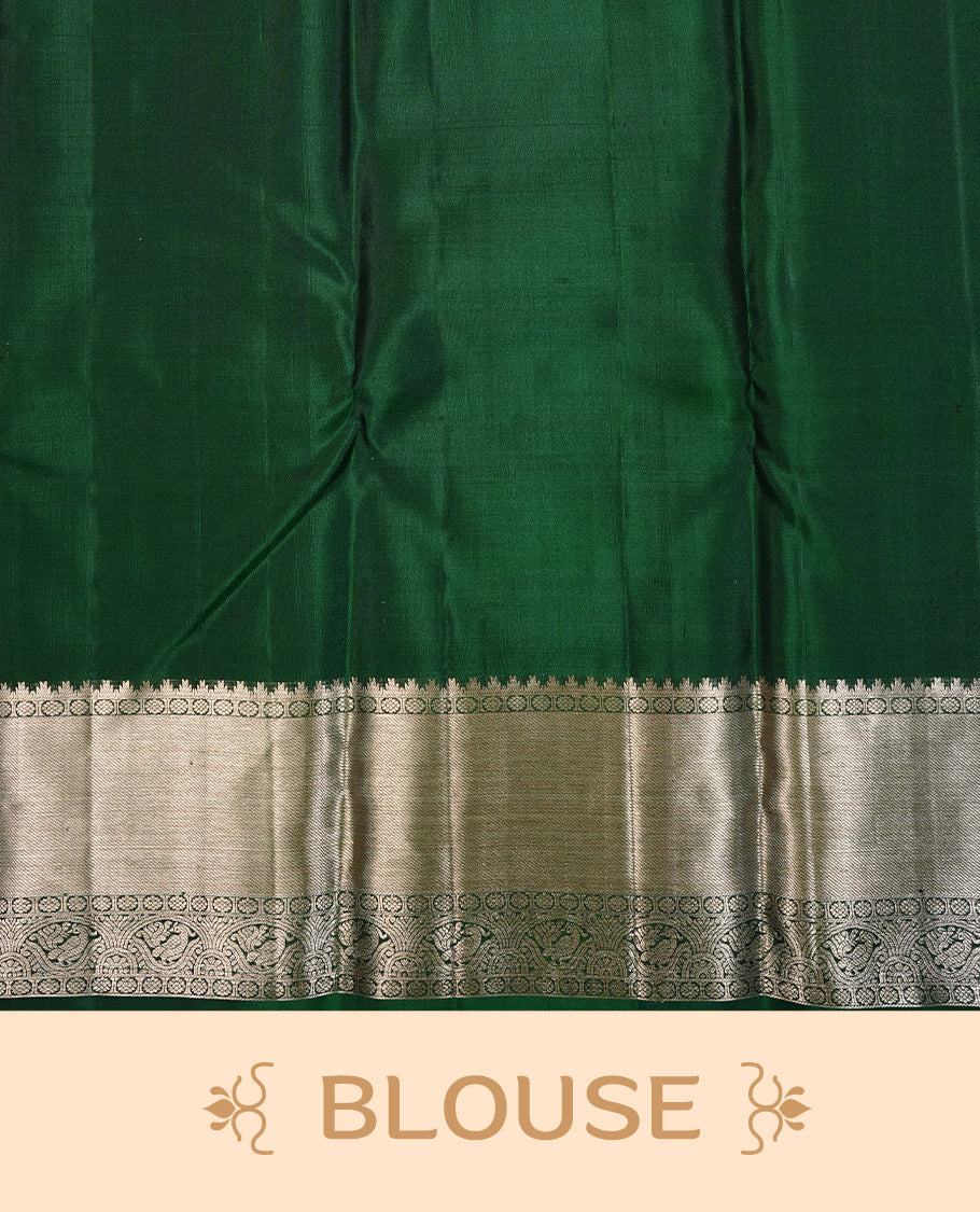 Dark Green Colour Pure Kancheepuram Silk Saree Featuring Silver Zari Floral Kodi Pattern on the Body, Highlighting a Traditional Silver Zari Border, Paired with a Matching Blouse Piece.