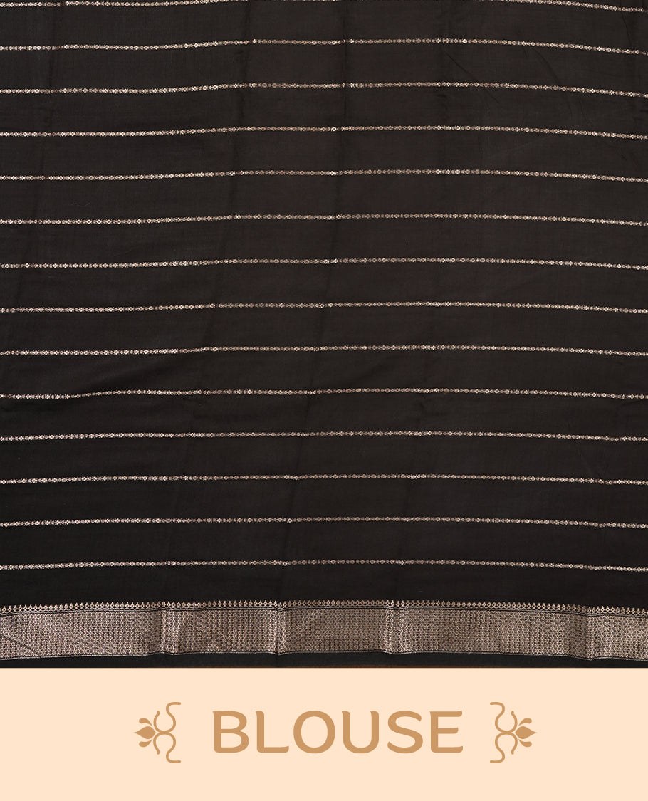 Black colour chanderi silk saree with gold zari strip pattern & white Floral print pattern On body, compilmented by self colour border with antique zari pattern and a matching blouse.