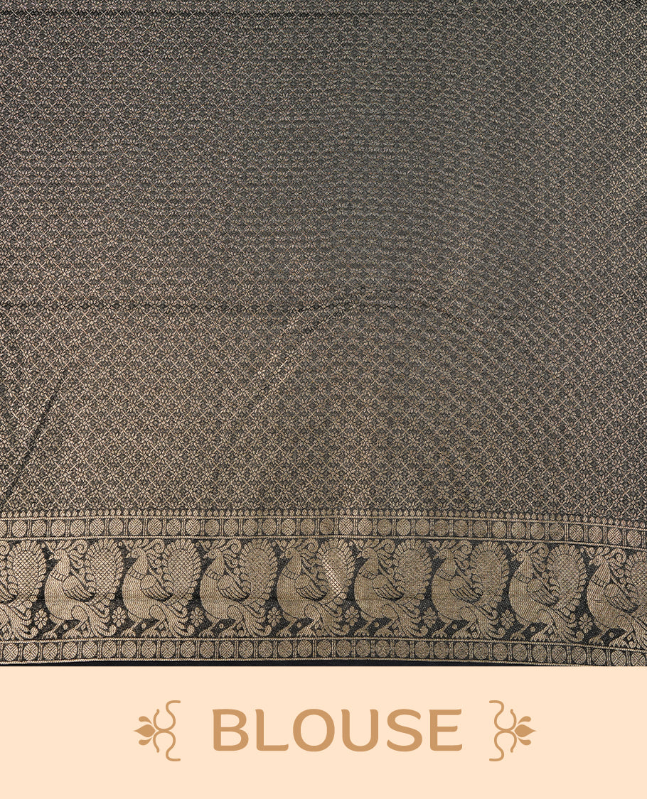 Black colour soft silk saree featuring gold zari pattern on body, complemented by self colour with traditional border, paired with matching blouse piece.