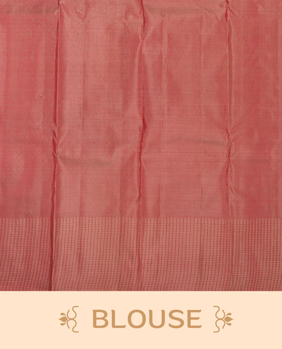 Dark mauve colour Vasundhara silk saree adorned with all-over tiny motifs on the body, complemented by a self colour with tiny diamond pattern with gold tree motifs on border and paired with a matching blouse piece.