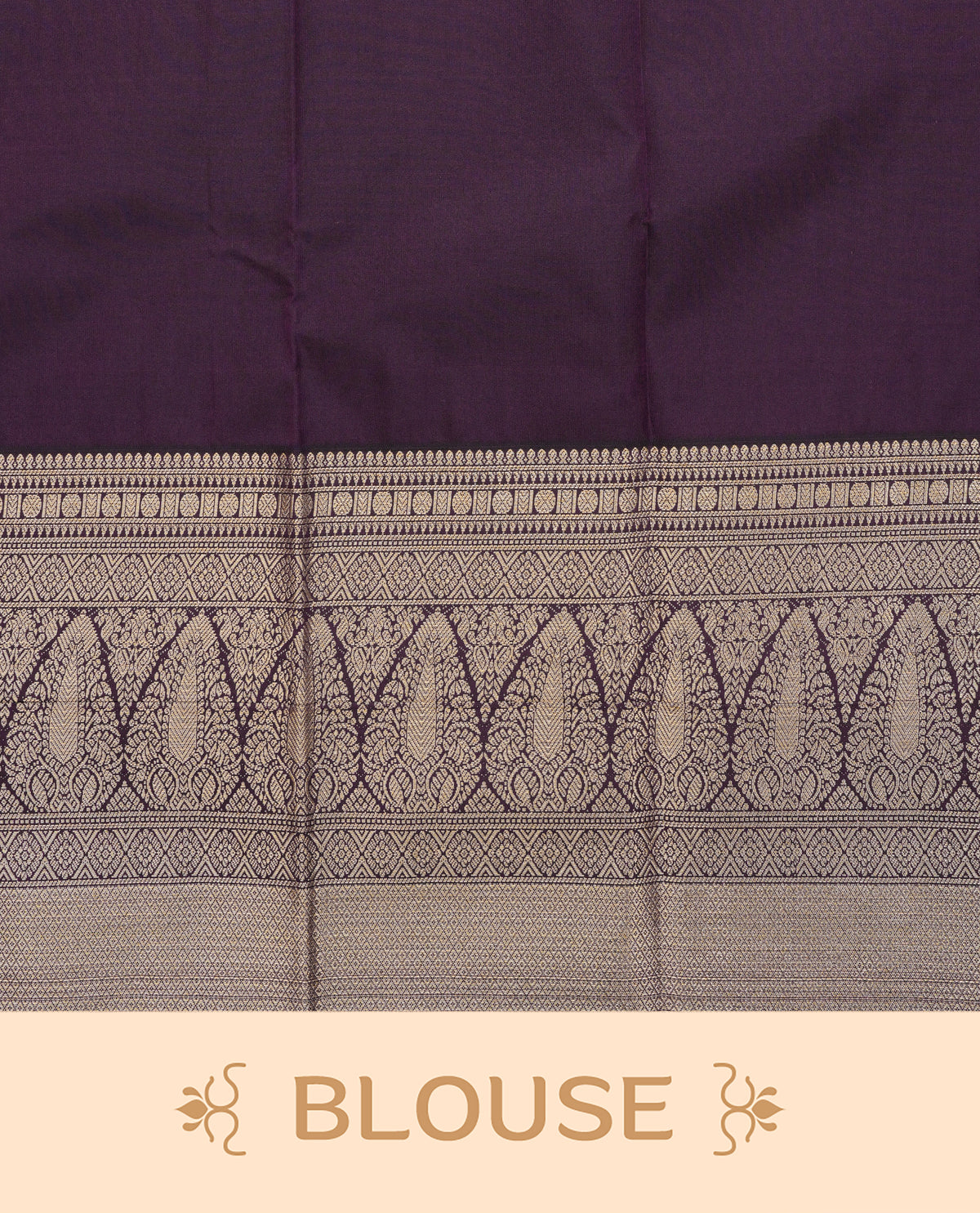 Dark purple colour soft silk saree featuring gold zari buttas on body, contrast self colour gold zari traditional border, grand pallu comes with matching blouse piece.