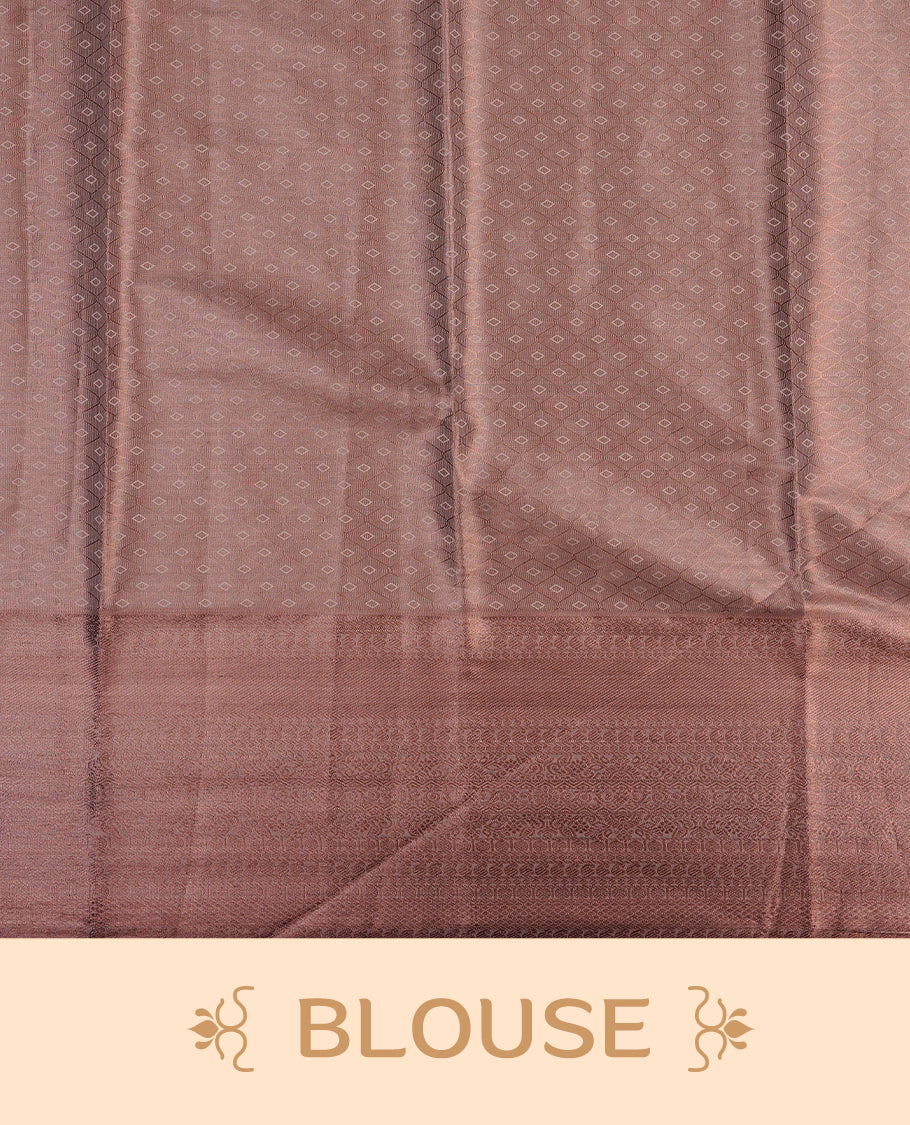 Copper colour semi tissue silk saree featuring copper zari pattern on body, selfcolour with gold zari traditional border, paired with matching blouse piece.