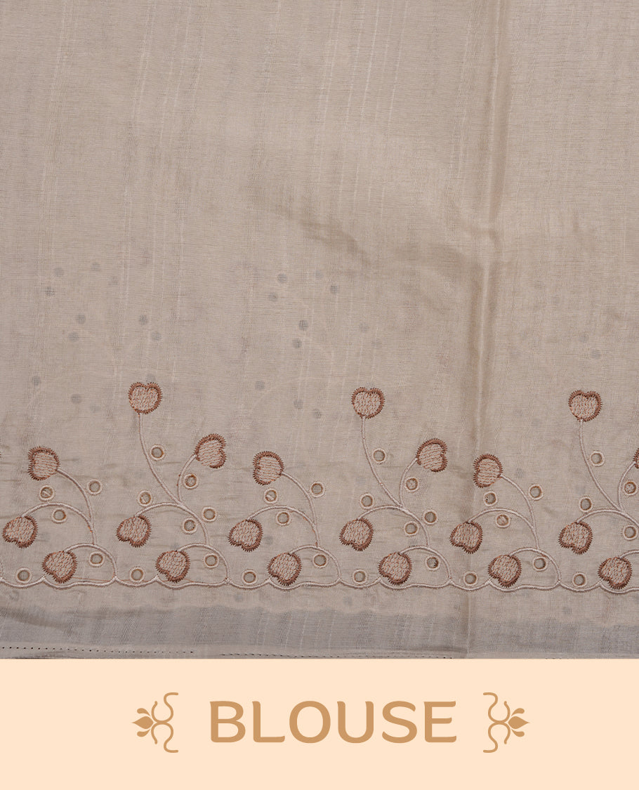 Beige colour Tussar silk saree featuring Elegant plain body, highlighting Brown colour thread floral kodi worked scalp border, pallu and paired with matching blouse piece.