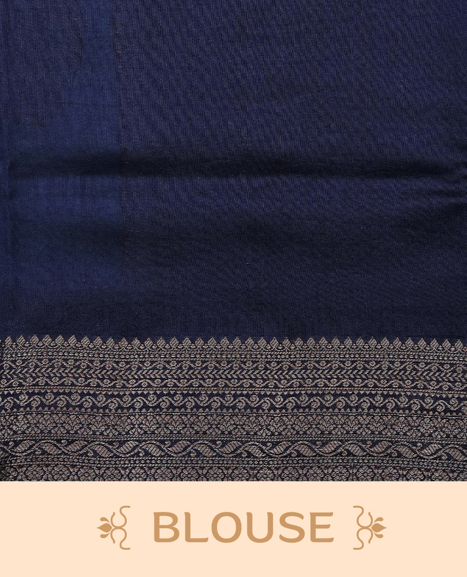 Pastel Aqua Colour Tussar Silk saree with elegant antique zari floral motifs On Body, a contrasting navy blue zari border, a rich zari pallu, Paired With a matching blouse piece.