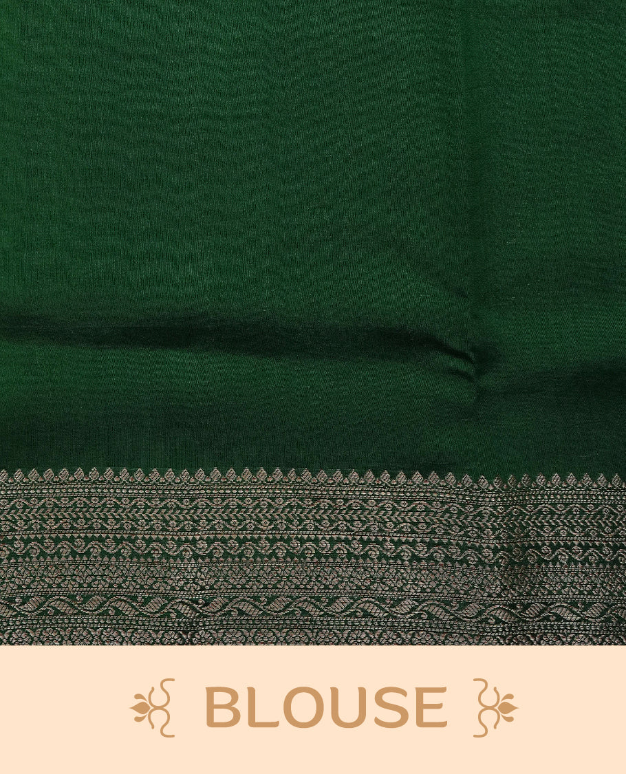 Pastel Pistachio Green Colour Tussar Silk saree with elegant antique zari floral motifs On Body, a contrasting dark green zari border, a rich zari pallu, and a matching blouse piece.