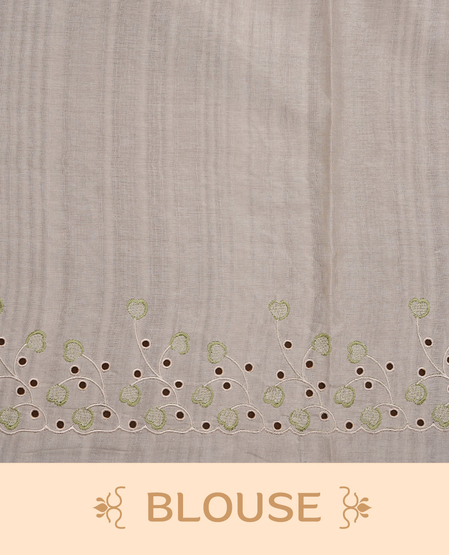 Beige colour Tussar silk saree featuring Elegant plain body, highlighting Green colour thread floral kodi worked scalp border, pallu and paired with matching blouse piece.