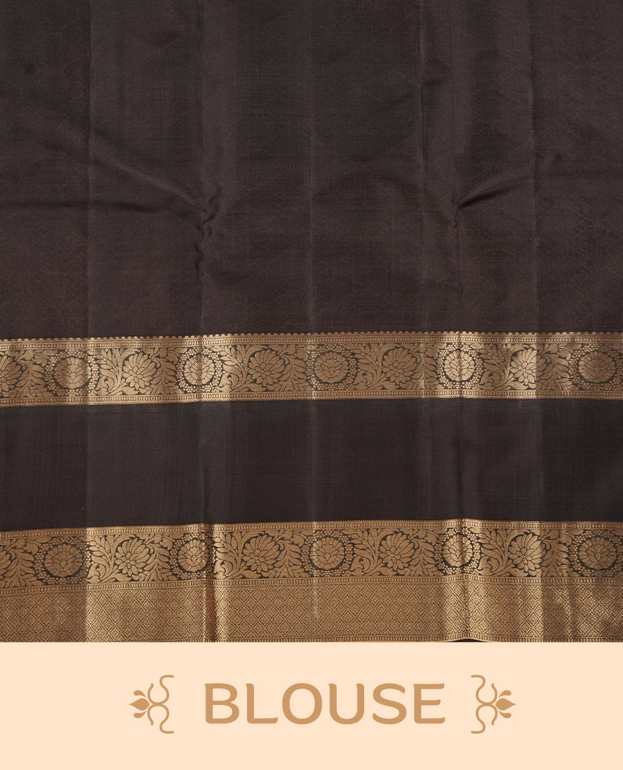 Khaki colour soft silk saree featuring gold zari motifs on the body, complemented by a contrast chocolate traditional zari border and pallu, paired with matching blouse piece.