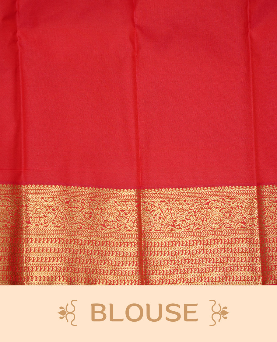 Mustard coloured soft silk saree featuring gold zari stripes and motifs across the body, enhanced with a Self colour border and pallu, paired with a matching contrast blouse piece.