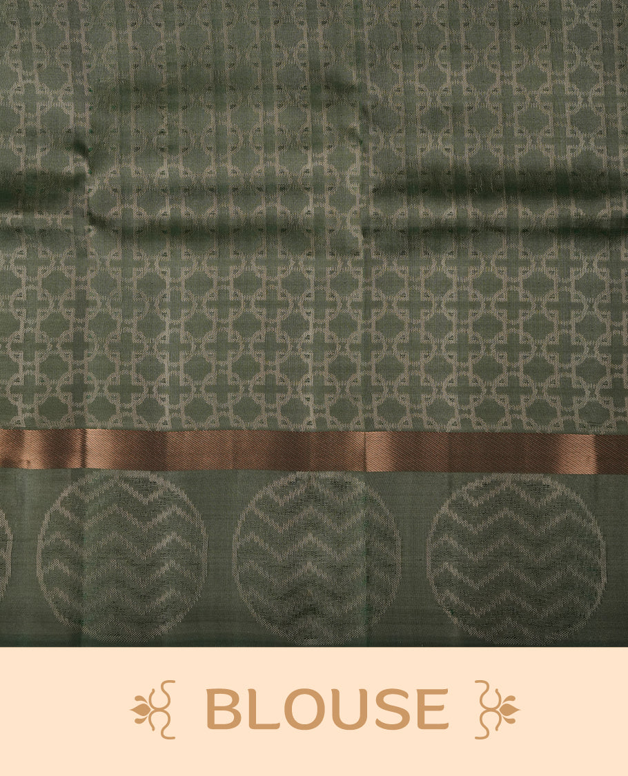 Cream colour soft silk saree featuring gold zari floral motifs on the body, complemented by a contrast green zari floral kodi border and pallu, paired with a matching blouse piece.