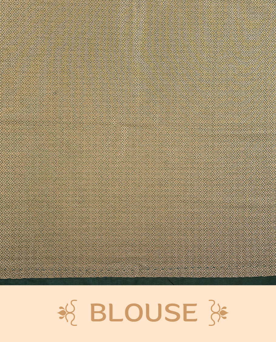 Dark green colour semi soft silk saree featuring gold zari motifs on across body, self colour border with traditional gold zari pattern, pallu and paired with matching blouse.