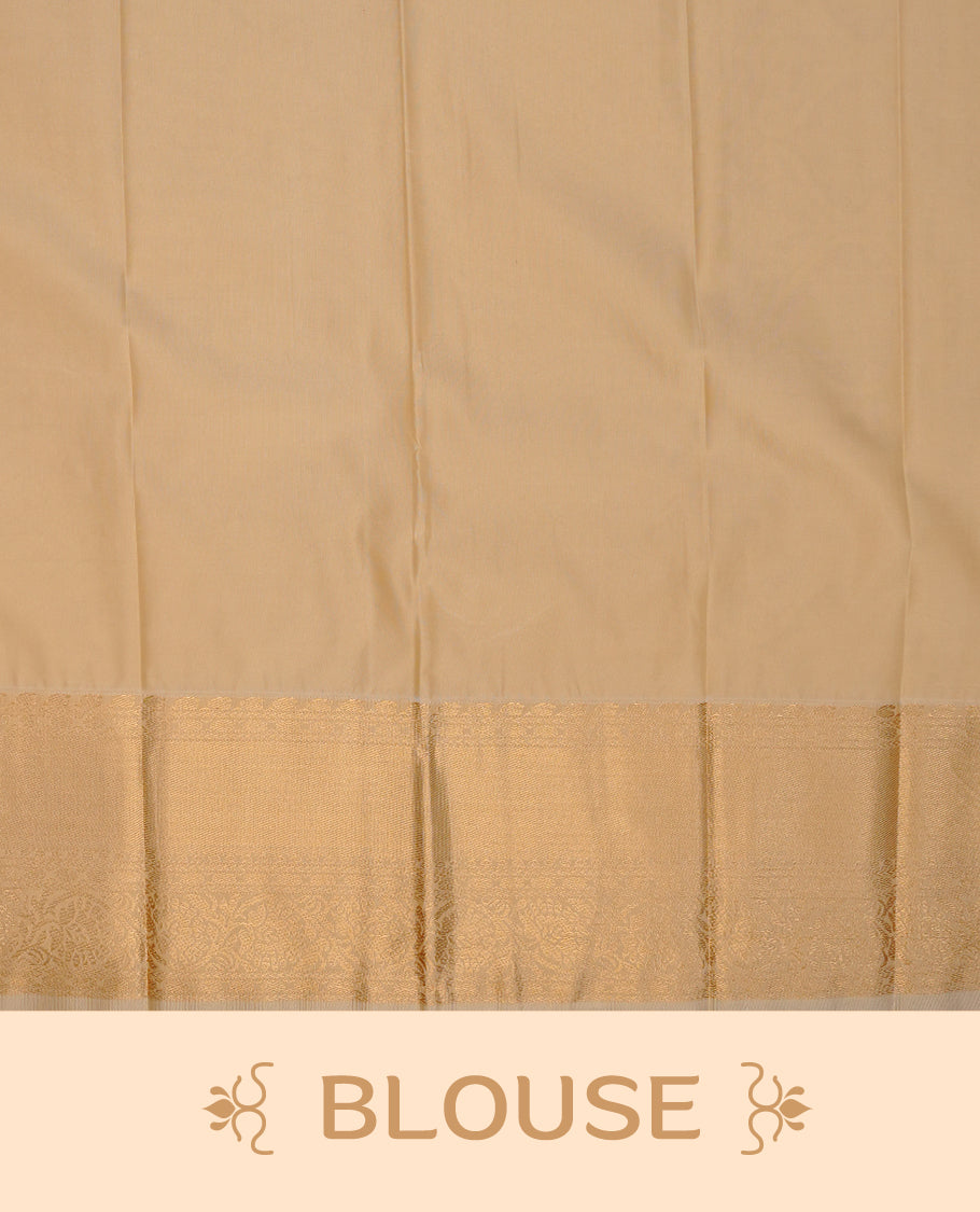 Orange coloured soft silk saree featuring gold zari stripes and motifs across the body, enhanced with a contrast Cream border and pallu, paired with a matching contrast blouse piece.
