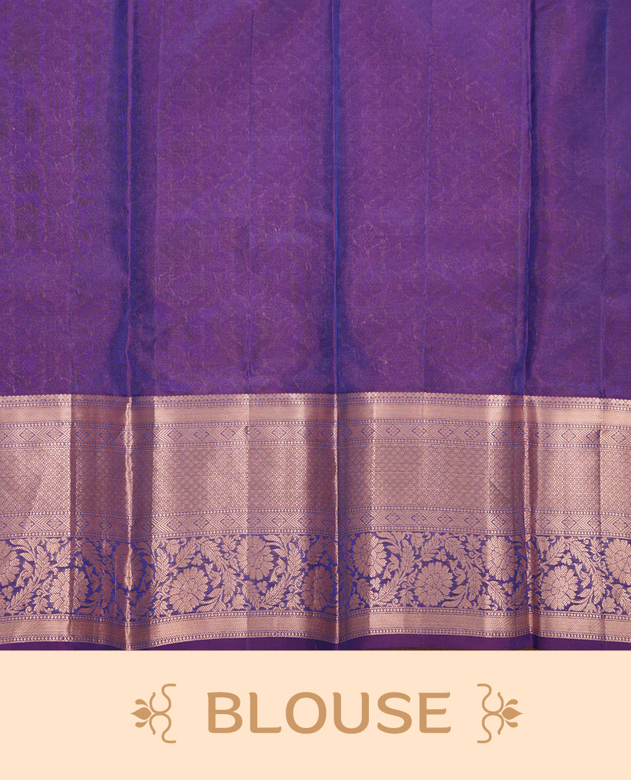 Peacock colour Soft silk saree featuring gold zari floral motifs on the body, complemented by a contrast Indigo traditional zari floral kodi border and pallu, paired with a matching blouse piece.