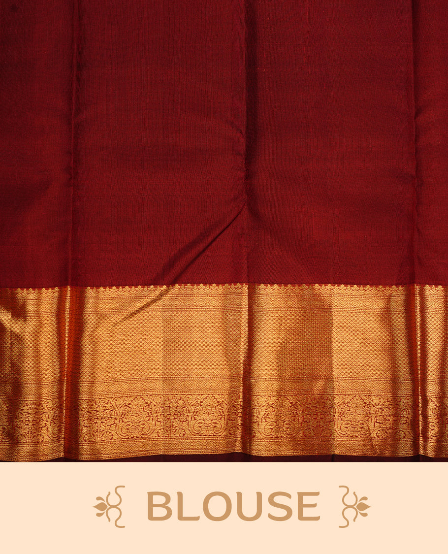 Chocolate colour kancheepuram silk saree featuring gold zari floral kodi pattern on body, complemented by self colour with traditional border, paired with matching blouse piece.