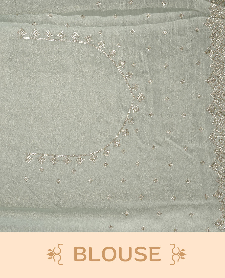 Mint colour organza designer saree featuring Gold stone motifs on body, highlighting light weight stone worked border, paired with matching blouse piece.