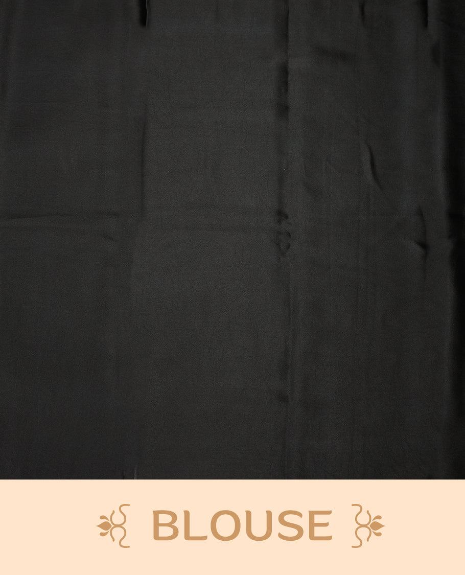 Black colour saree adorned with bold Light Blue floral motifs and matching border accents, paired with a coordinating blouse