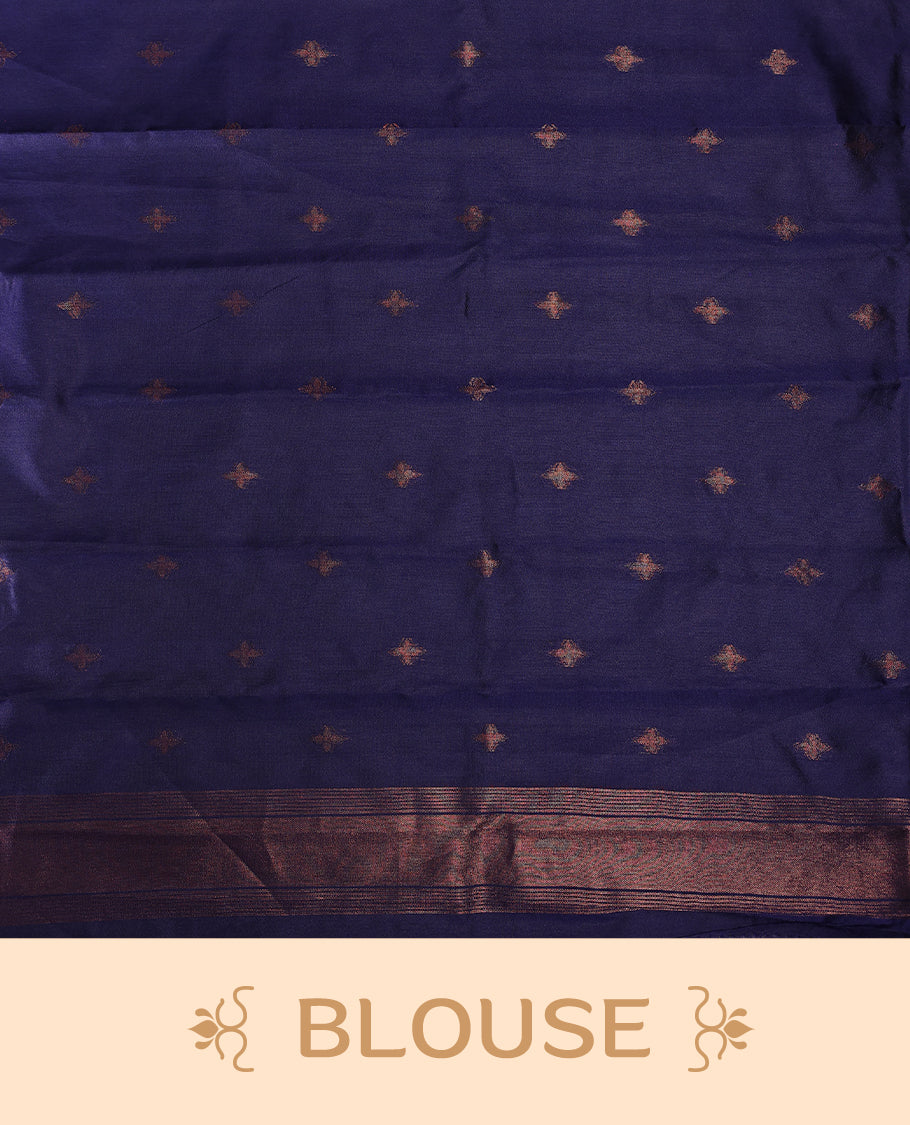 Peach pink saree highlighted with bold black and navy zigzag motifs along the border, complemented by a deep maroon blue pallu with a subtle sheen. Paired with a coordinated blouse piece.