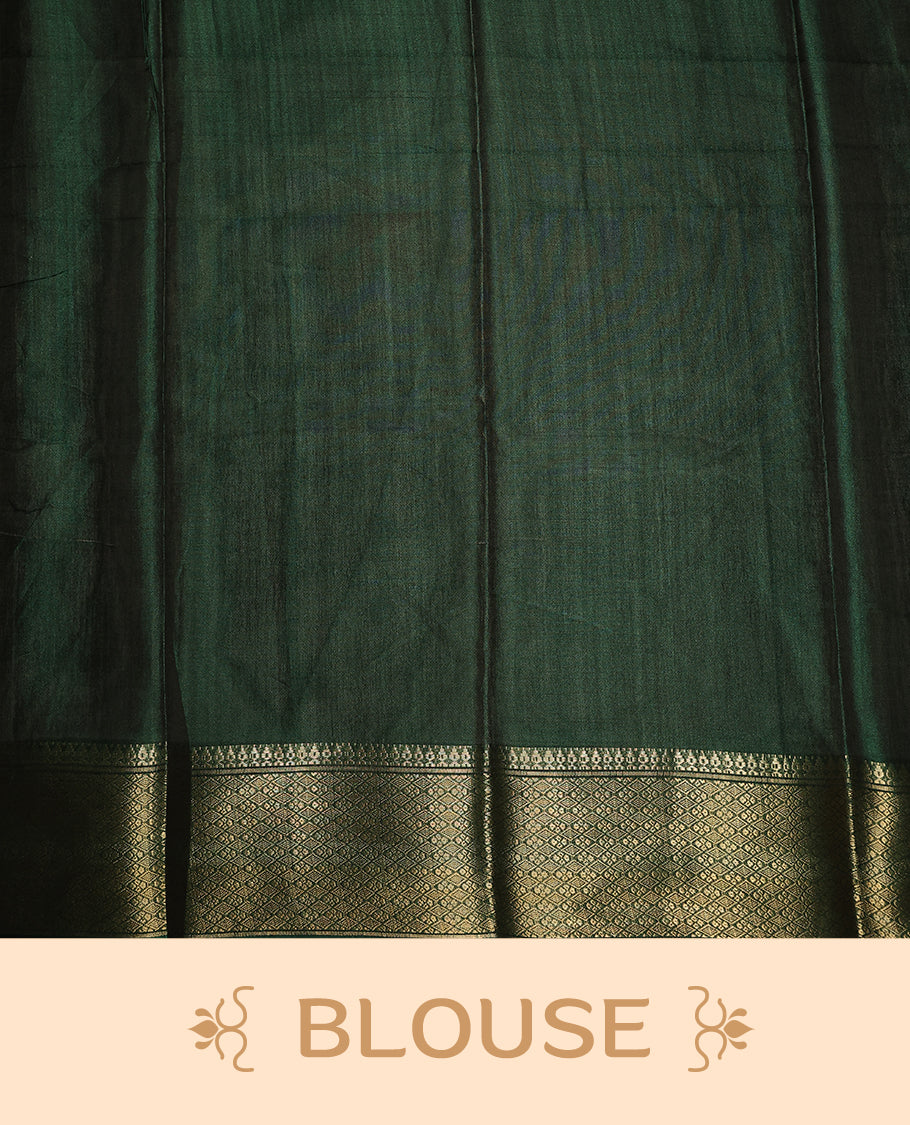 Rich Grape colour saree featuring intricate floral prints across the body, highlighted with a woven Green zari border, complemented by an artistic Kalamkari inspired pallu design, and paired with a matching blouse
