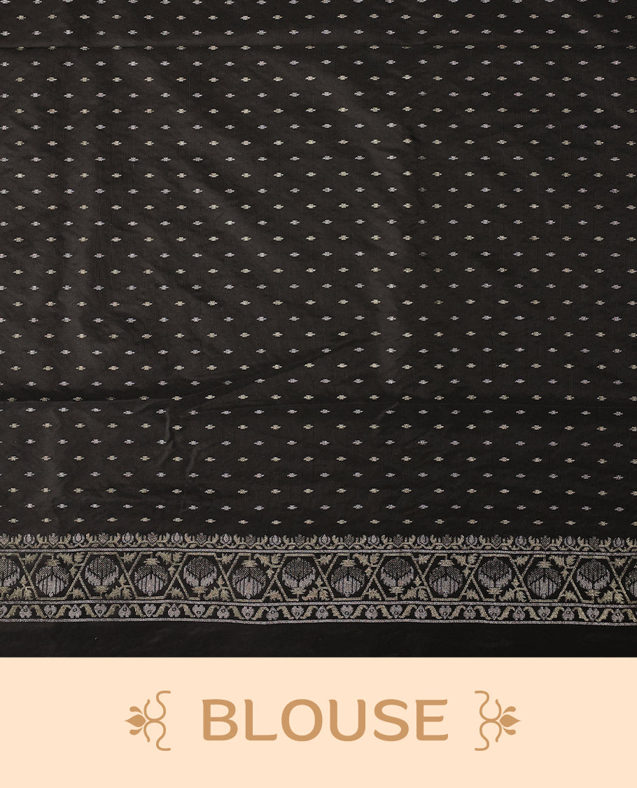 Classic black Banaras soft silk saree adorned with silver zari floral vines, detailed woven border, and grand paisley pallu, Comes with a matching blouse & A regal pick for festive and formal occasions.