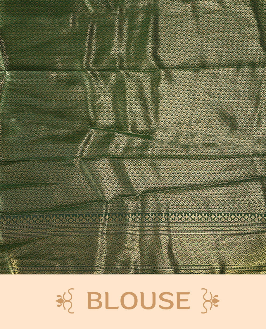 Elegant Semi stitiched green and gold Dhavani set featuring a lustrous gold skirt with intricate zari weave and matching green border, paired with a deep green dupatta embellished with delicate zari motifs for a regal look
