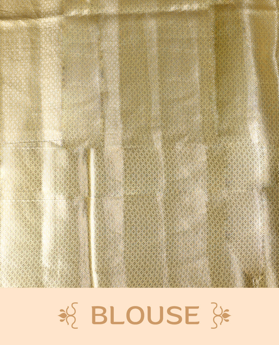 Golden Pure tissue Banaras saree featuring exquisite zari weaving throughout the body with a grand pallu highlighted by bold paisley motifs, making it a luxurious choice for weddings, festive occasions, and grand celebrations