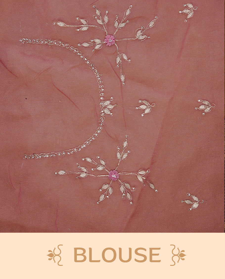 Mauve colour crush organza saree featuring gold threan floral and stone worked body, highlighting scalp designed border, paired with matching blouse piece.