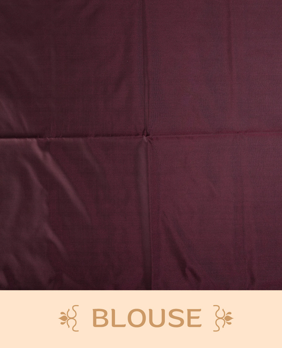 Greyish lavender colour semi soft silk saree, beautifully designed with rich floral woven motifs & The look is enhanced by a rich contrast deep wine border and pallu with tassels, paired with a matching blouse.