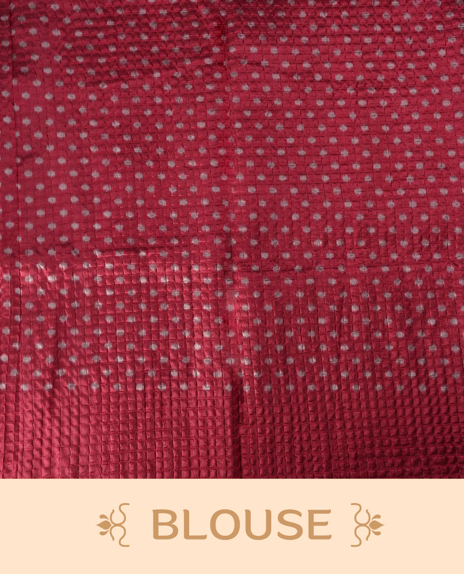 Classic off white colour saree adorned with intricate maroon tribal motifs and rich woven patterns on the pallu and border & Paired with matching blouse.