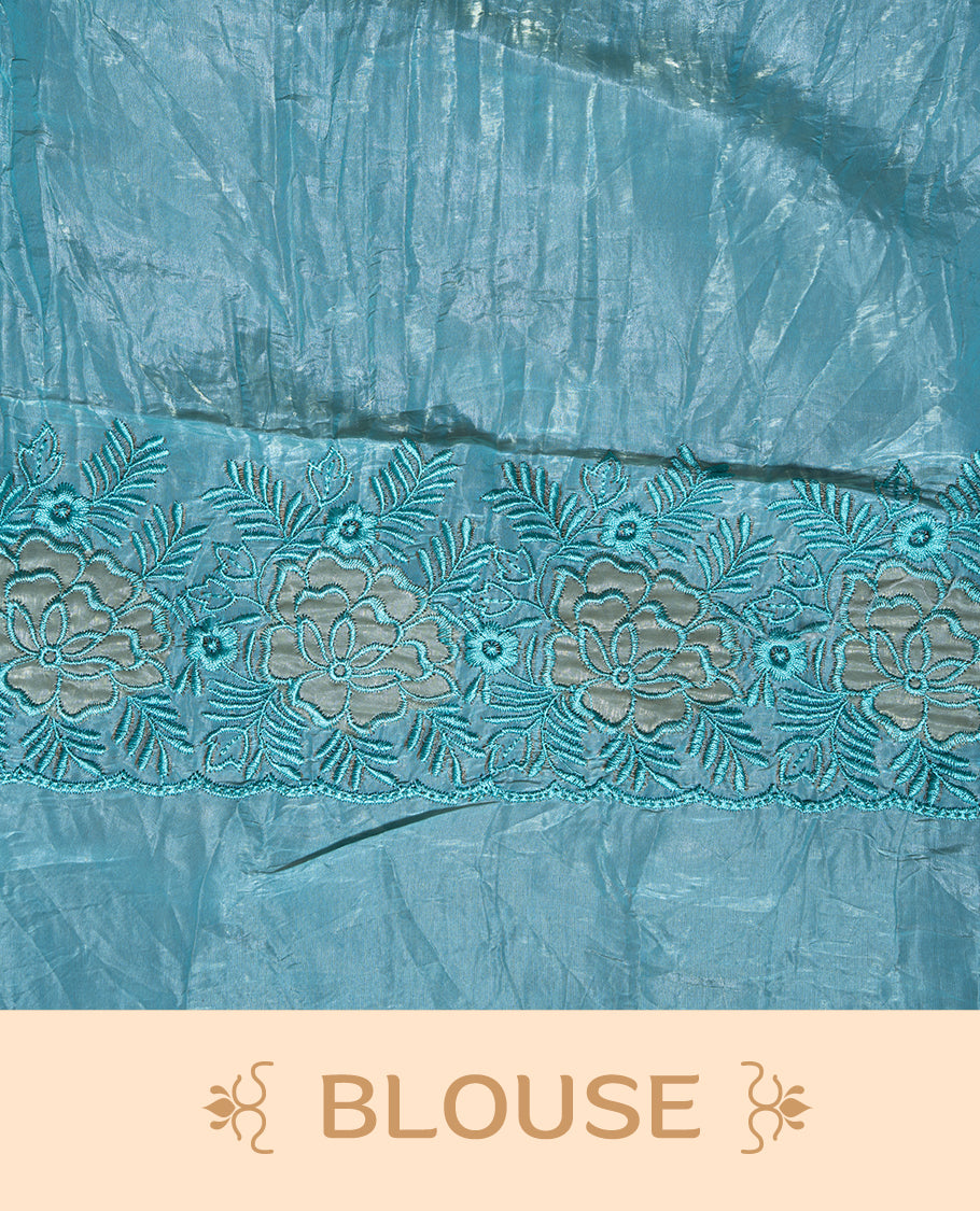 Aqua colour Crush Organza Featuring Plain body, Enrich with Floral thread pattern & scalp border, paired with matching blouse piece.