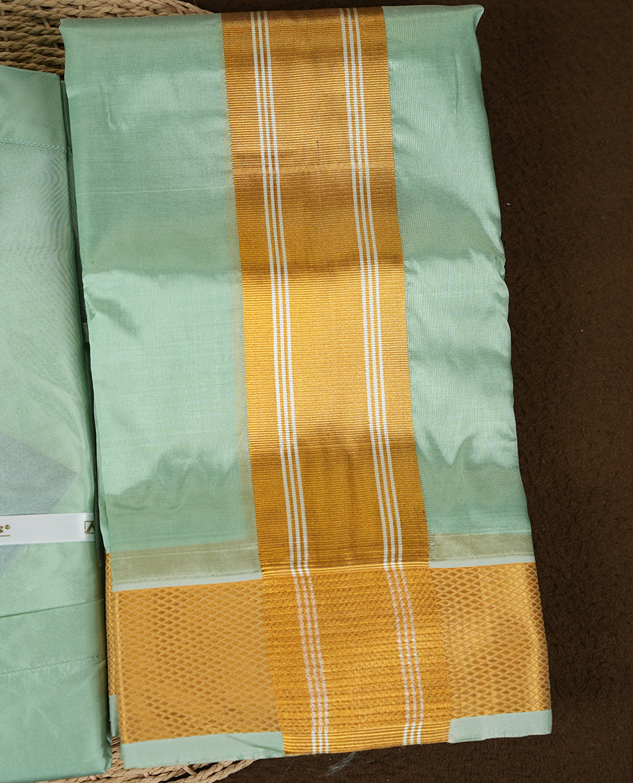 Pista colour Aswin’s wedding set featuring a refined silk shirt and matching dhoti with gold zari detailing, crafted for timeless elegance and perfect for traditional weddings and festive occasions.