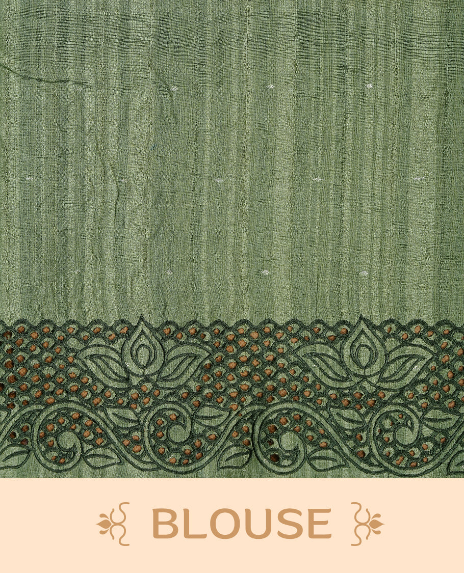 Green colour Semi Tussar silk saree features an intricate cutwork embroidered peacock motifs on border, paired with a matching unstitched blouse piece.