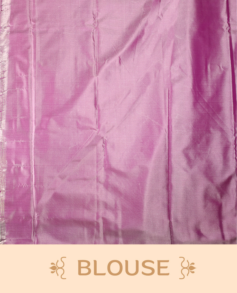 Lavender colour semi silk saree featuring delicate golden zari floral motifs across the body, complemented by a rich self-colour woven border and pallu, paired with a matching blouse.