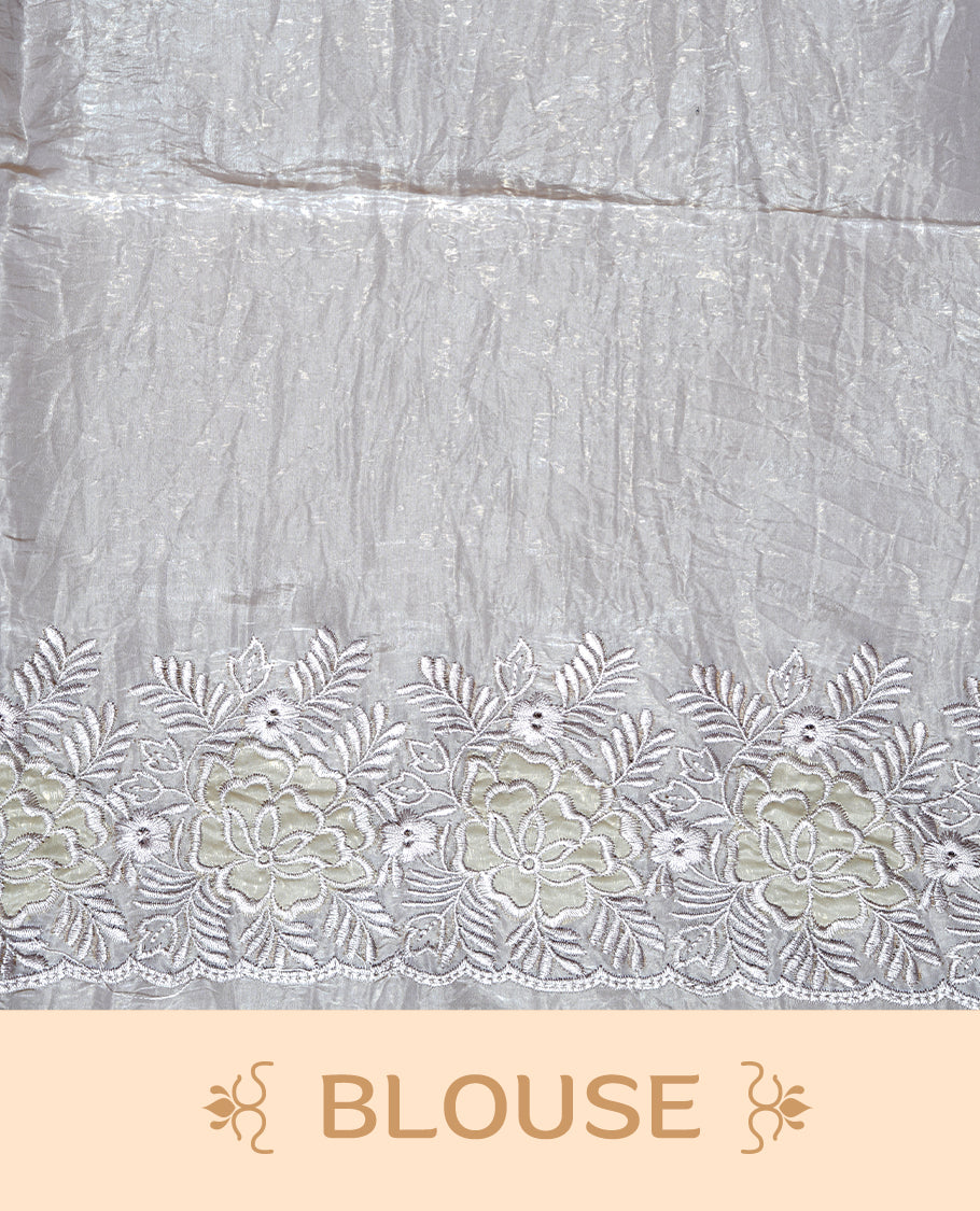 Grey colour Crush Organza Featuring Plain body, Enrich with Floral thread pattern & scalp border, paired with matching blouse piece.