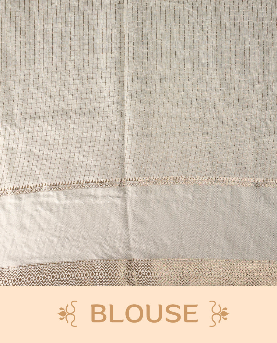 Off White viscose saree featuring subtle checkered patterns and a beautifully embroidered bird motif border, paired with a rich pallu & perfect for festive occasions, celebrations, and elegant gatherings.