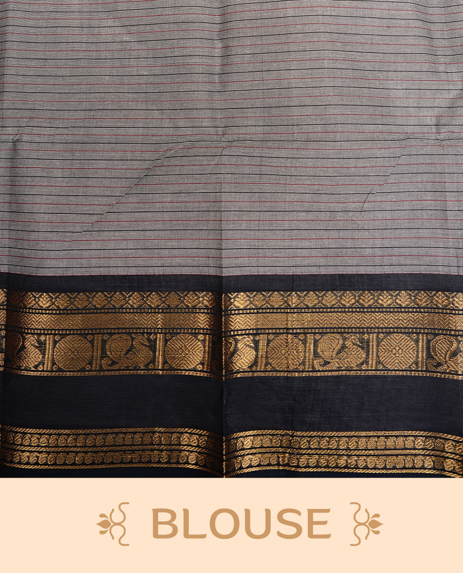Grey colour chettinad saree featuring Cream colour check pattern on body, complemented by contrast black colour with Gold zari border, paired wih matching blouse piece.