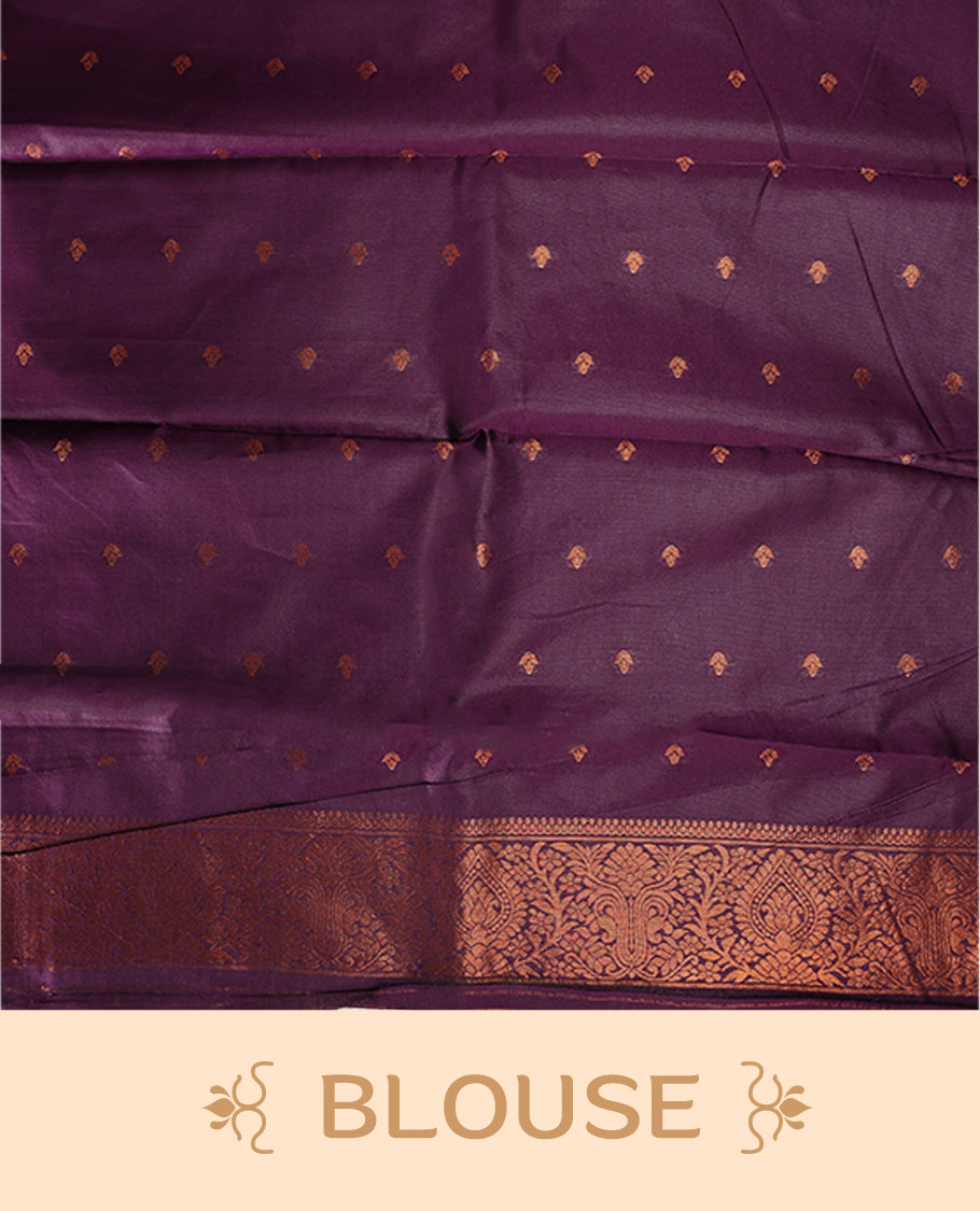 Lavender colour saree accentuated with bold deep purple zigzag woven borders and a contrasting rich copper zari pallu, paired with a matching blouse