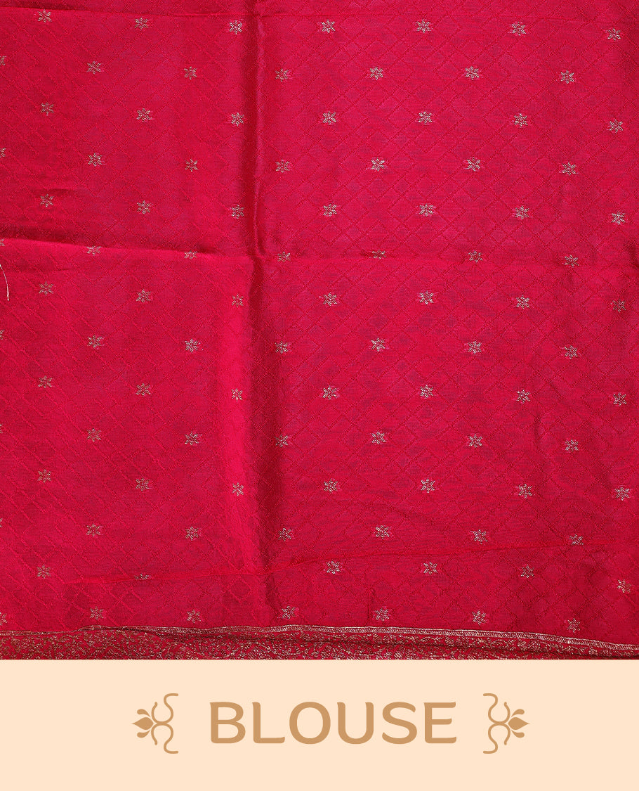 Rani pink semi Banaras tussar saree adorned with golden floral motifs in diagonal patterns across the body and a beautifully woven zari border, finished with a rich golden pallu, paired with a matching blouse.